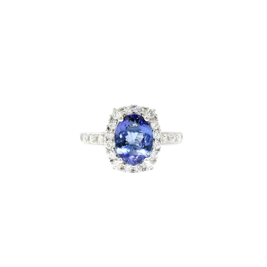 Oval Shaped Tanzanite Halo Style Ring in 18K White Gold
