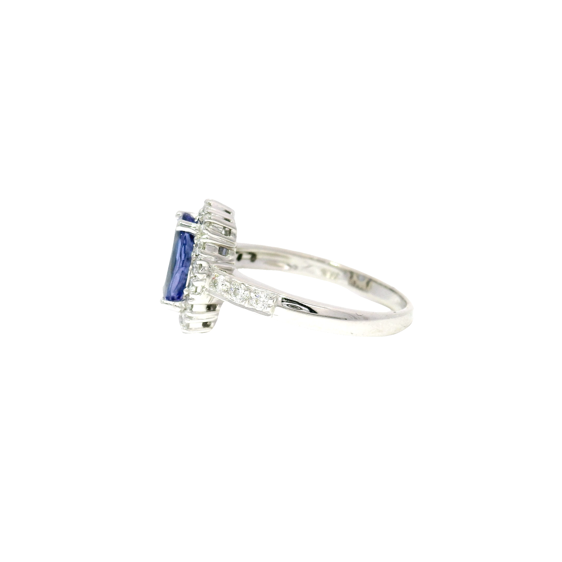 Oval Shaped Tanzanite Halo Style Ring in 18K White Gold