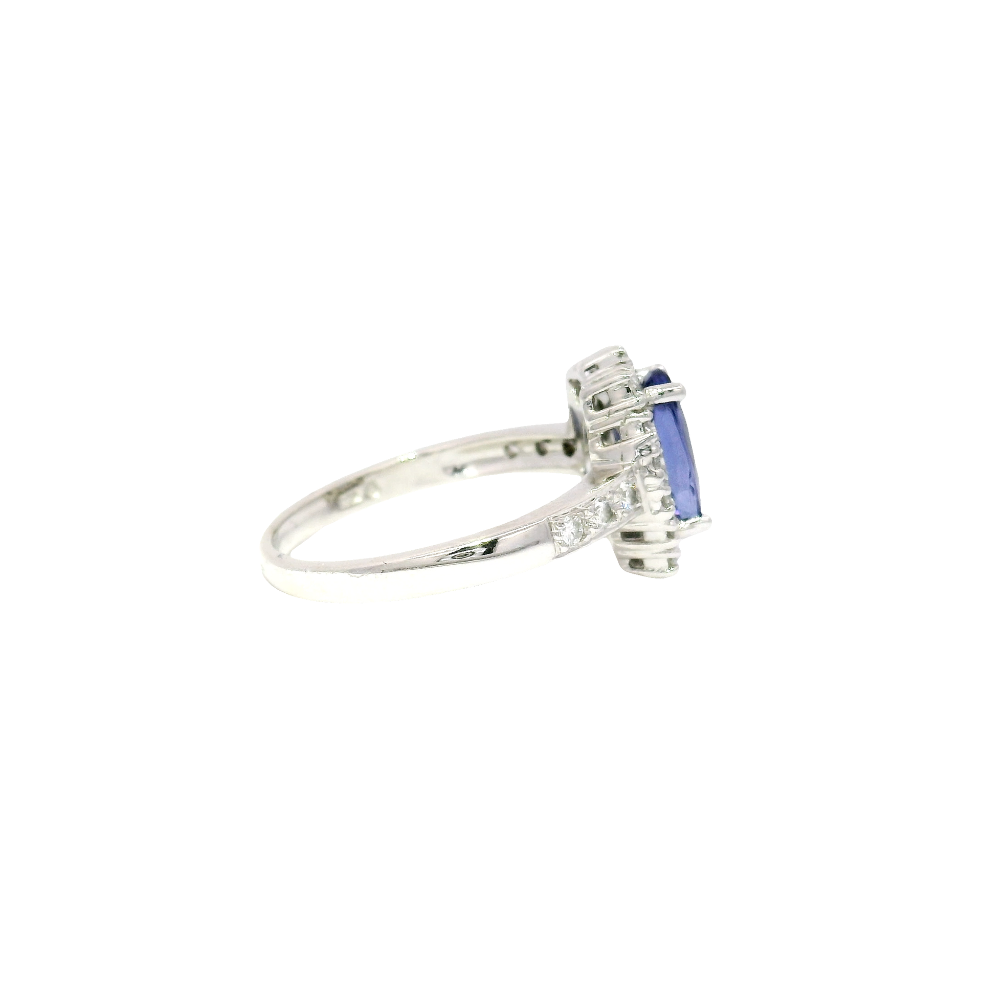 Oval Shaped Tanzanite Halo Style Ring in 18K White Gold