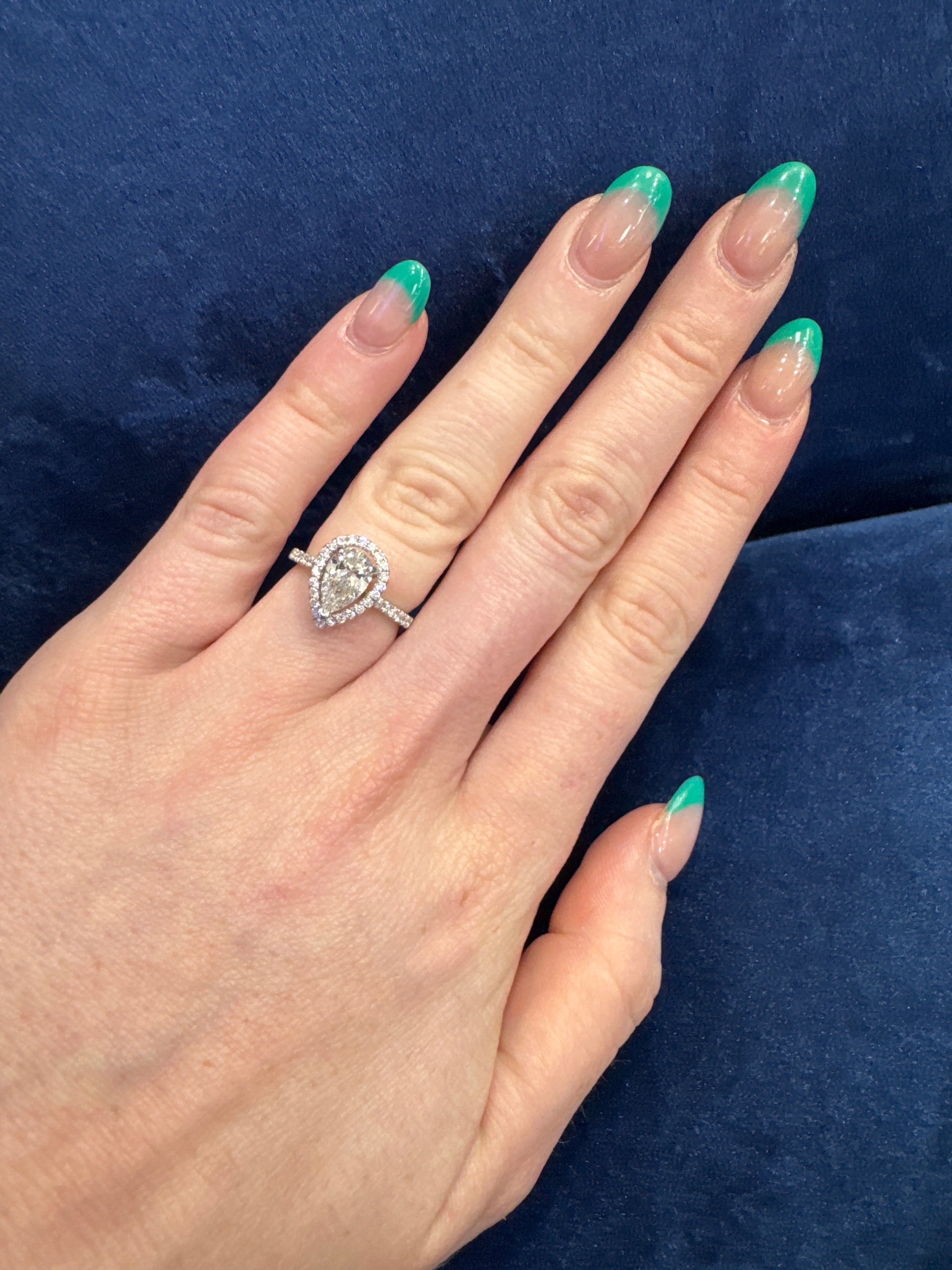 1.01ct. GIA G SI2 Pear Brilliant set in 14K White Gold Halo Sz 5