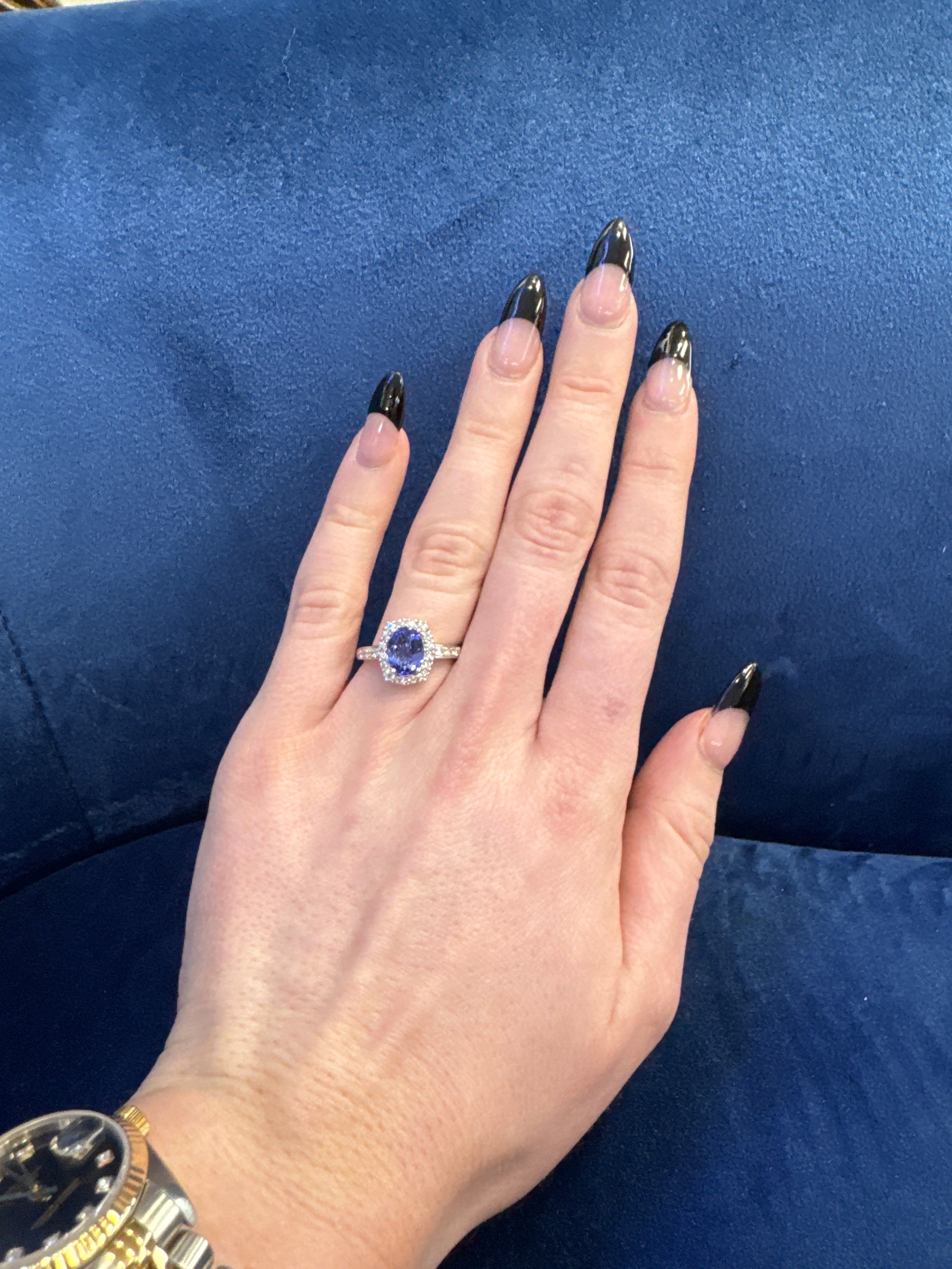 Oval Shaped Tanzanite Halo Style Ring in 18K White Gold