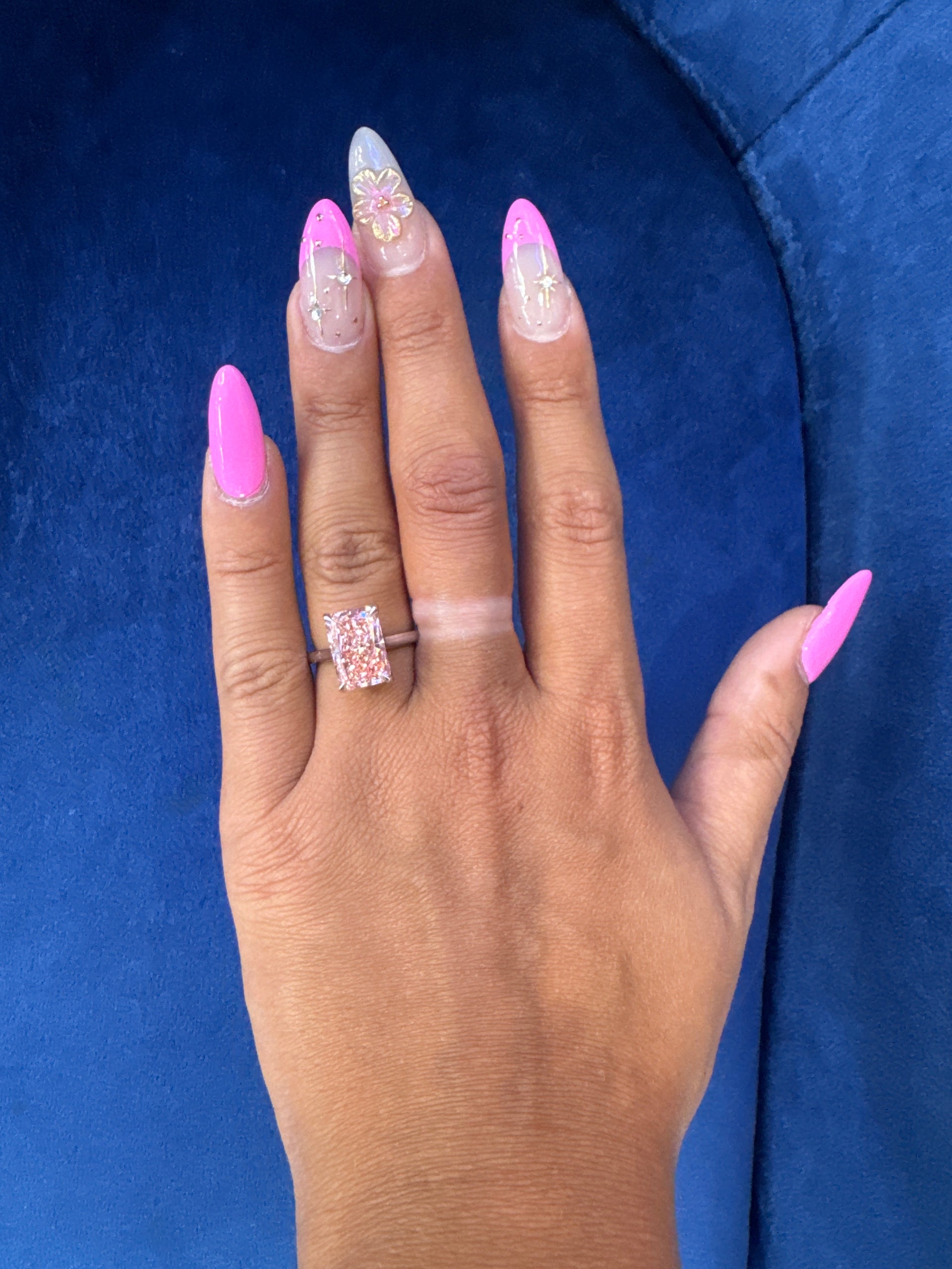 5.02ct. Fancy Vivid Pink VVS2 Elongated Radiant Diamond Set in 14K White Gold Cathedral Mounting