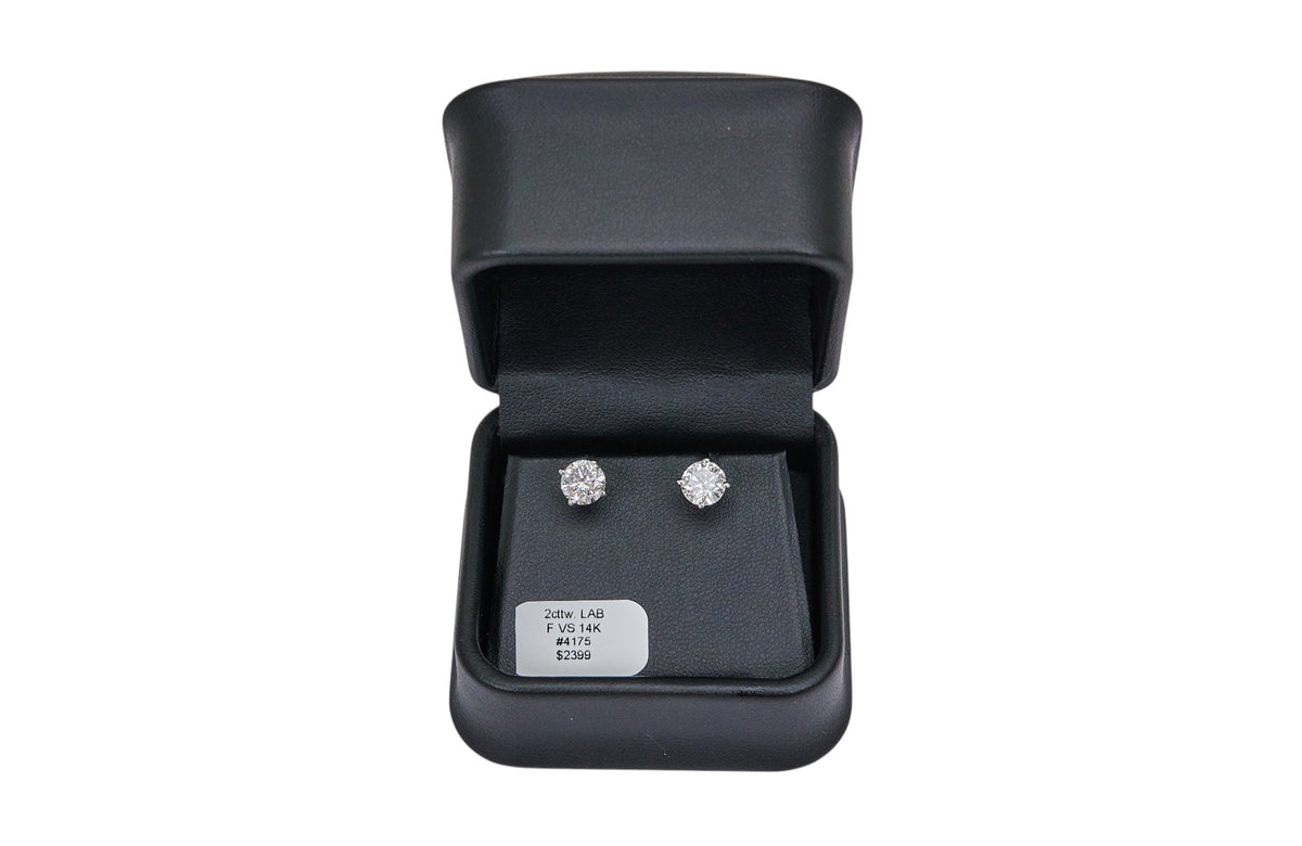 2cttw F VS Lab Grown Round Diamond Studs Set in 14K White Gold ARE THESE ROUND OR CUSHION?????