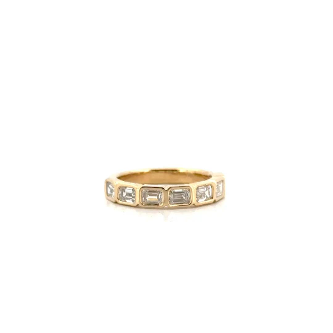 1.3cttw. Bezel Set Lab Grown Emerald Band in 14K Yellow Gold