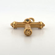 Cross Pendant Featuring a Ruby Cabochon in 18K Yellow Gold
