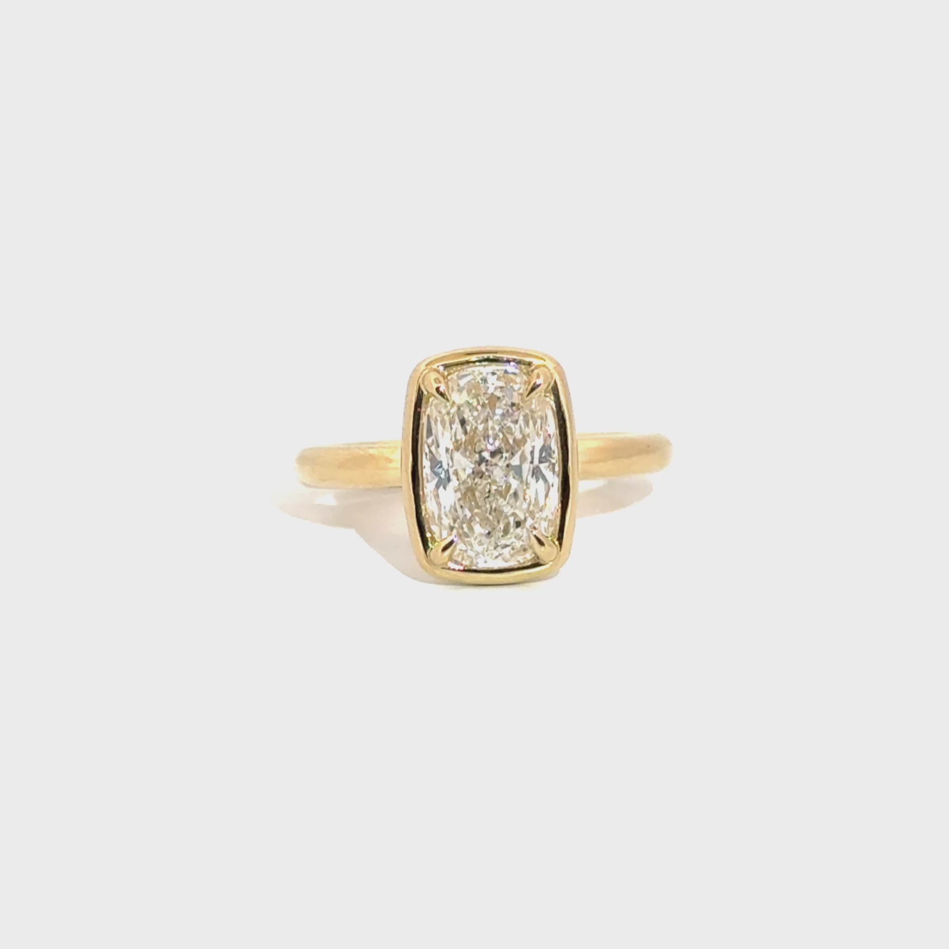 3.03ct. E VS1 Lab Grown Elongated Cushion Set in 14K Yellow Gold Cloud Bezel