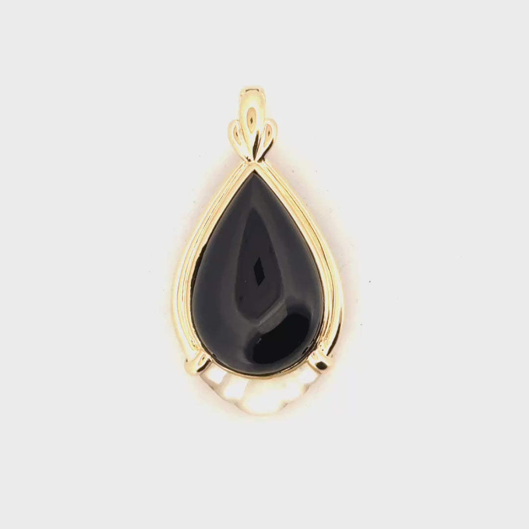 Black Onyx Cabachon Accented with Mother of Pearl Set in 14K Yellow Gold