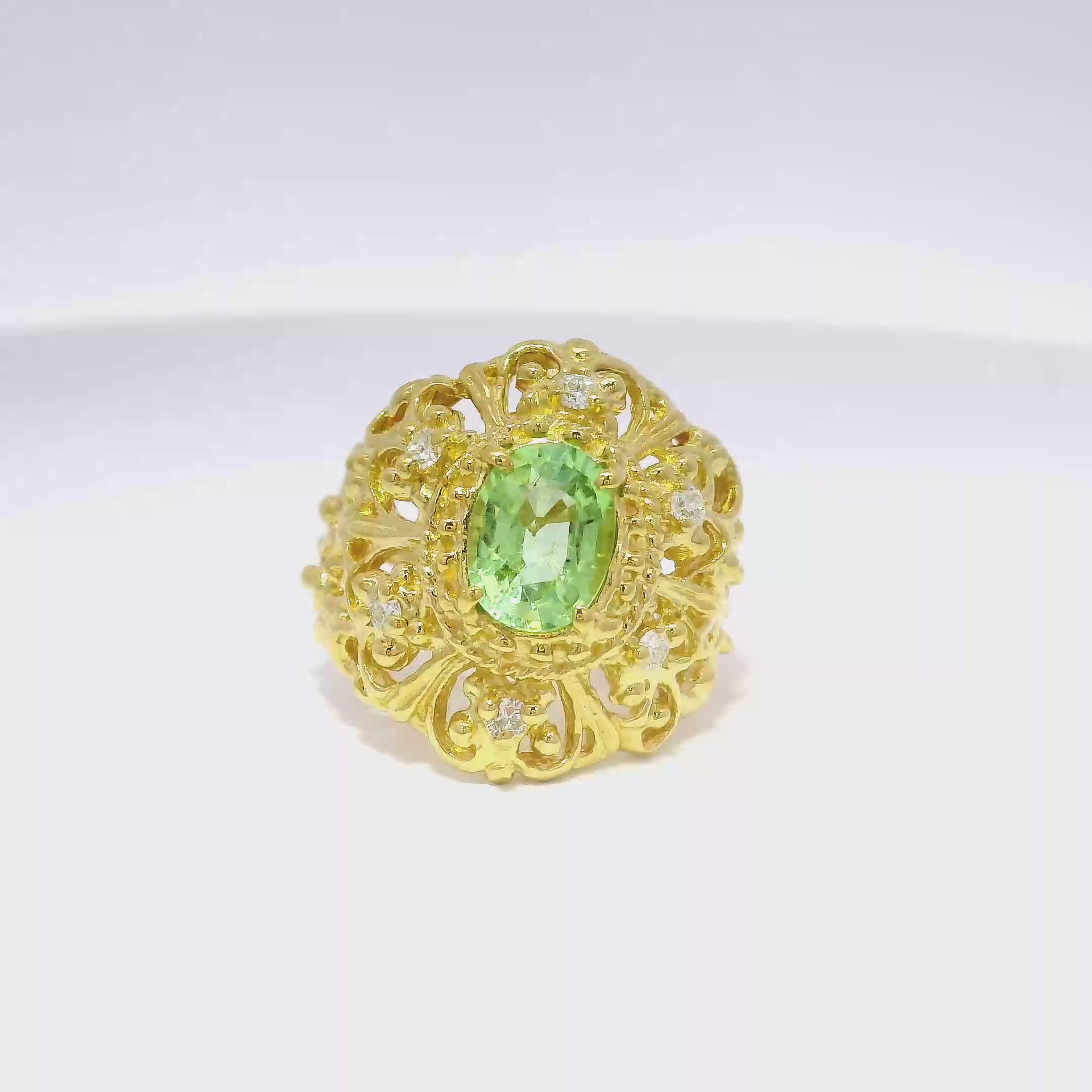 Oval Cut Peridot Set in 18K Filagree Design Fashion Ring