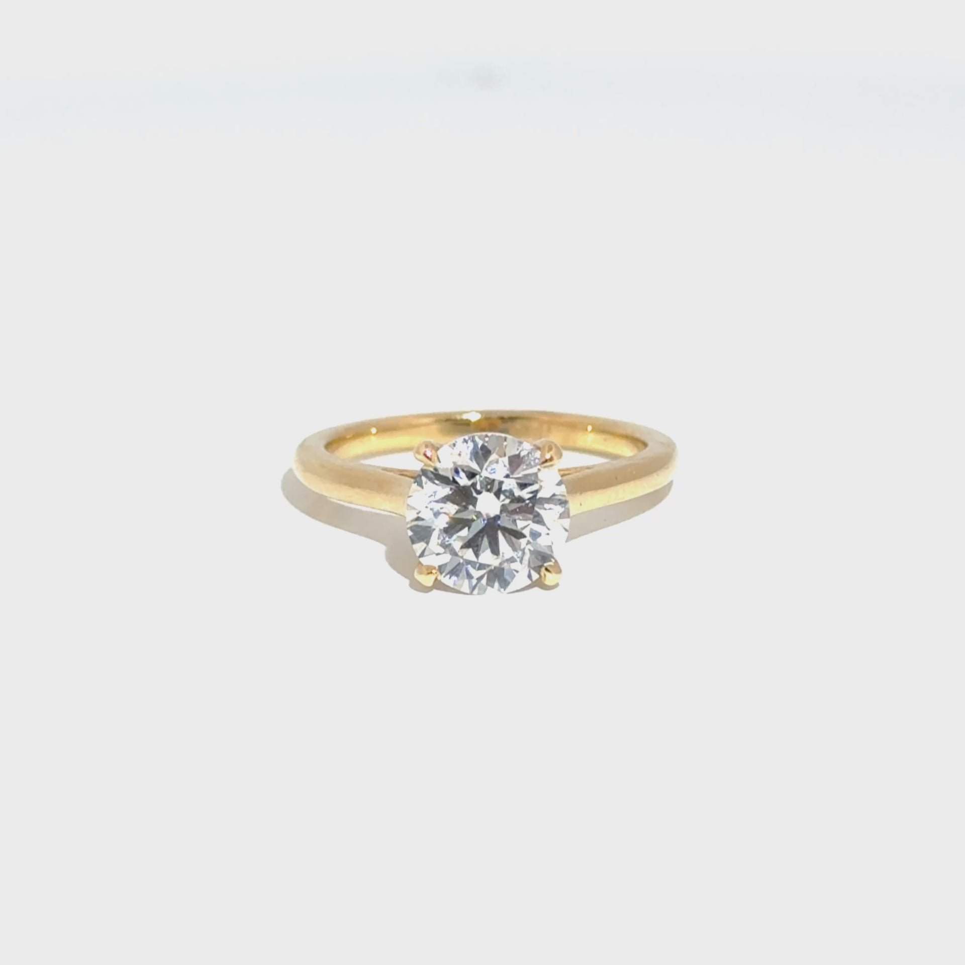 2.19ct. F VS1 Round Set in 14K Yellow Gold Cathedral Mounting