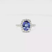 Oval Shaped Tanzanite Halo Style Ring in 18K White Gold Sz 7