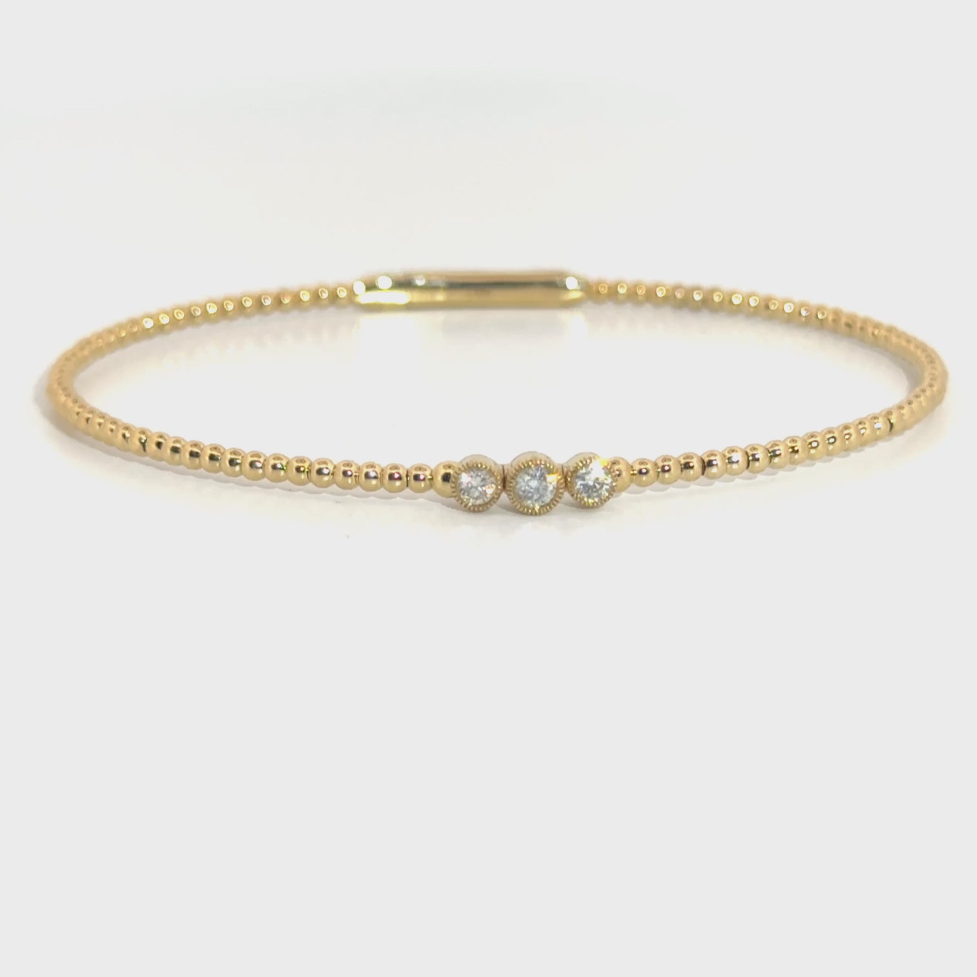 .25cttw. Diamond Flexible Bangle in 14K Yellow Gold