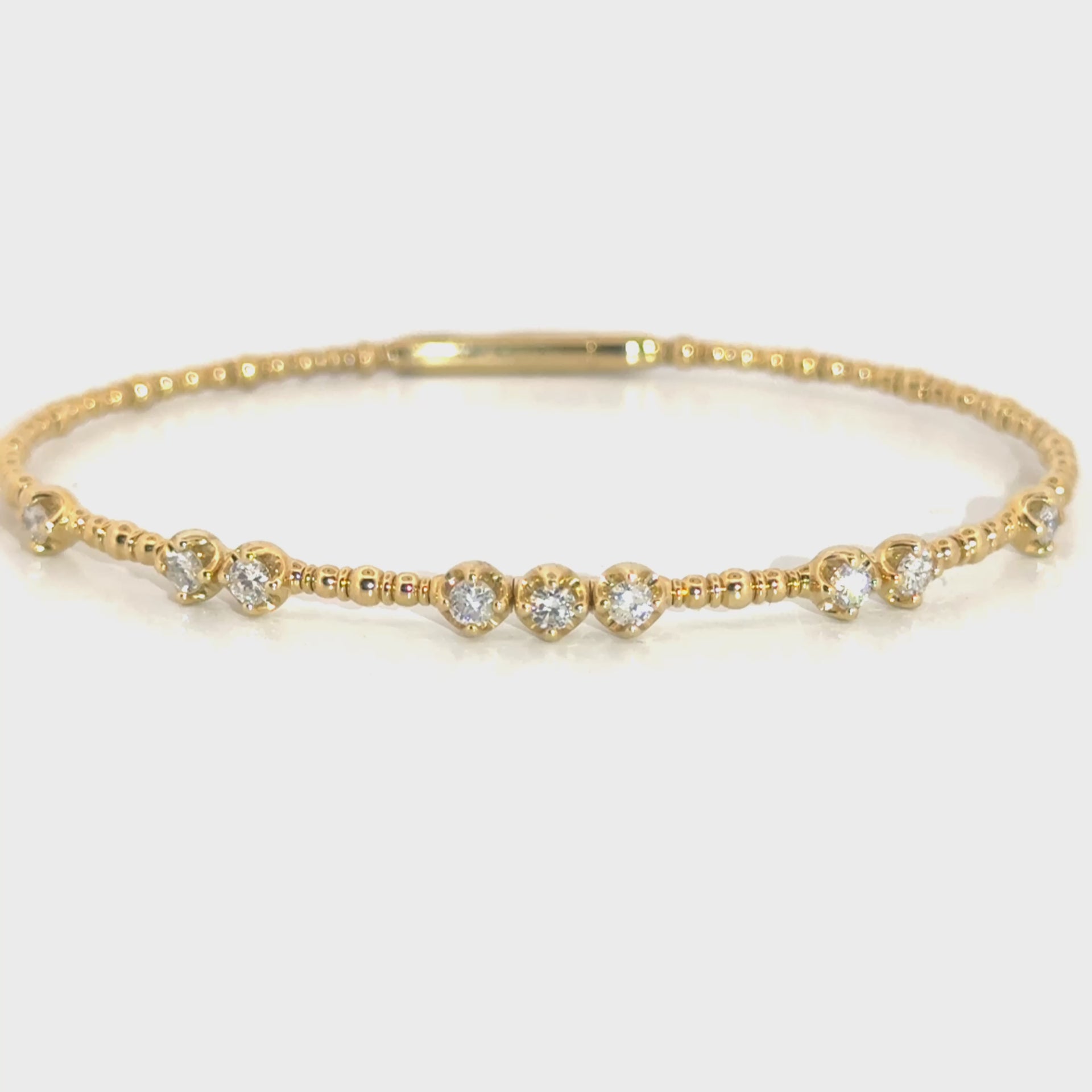 .65cttw. Diamond Flexible Bangle in 14K Yellow Gold