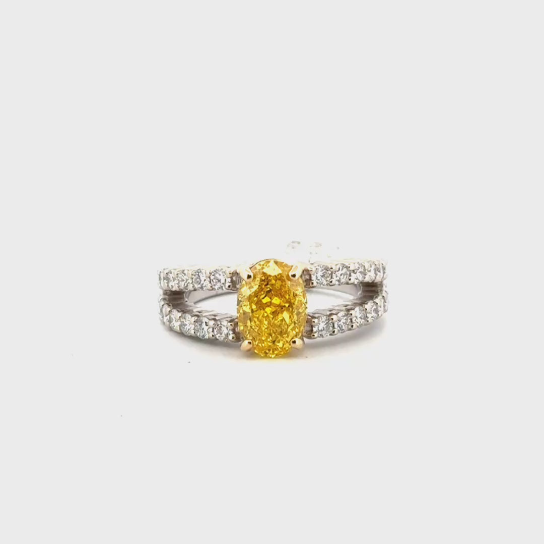 2.21ct. F VS1 Fancy Vivid Yellow Natural Diamond Oval Set in 14K White Gold