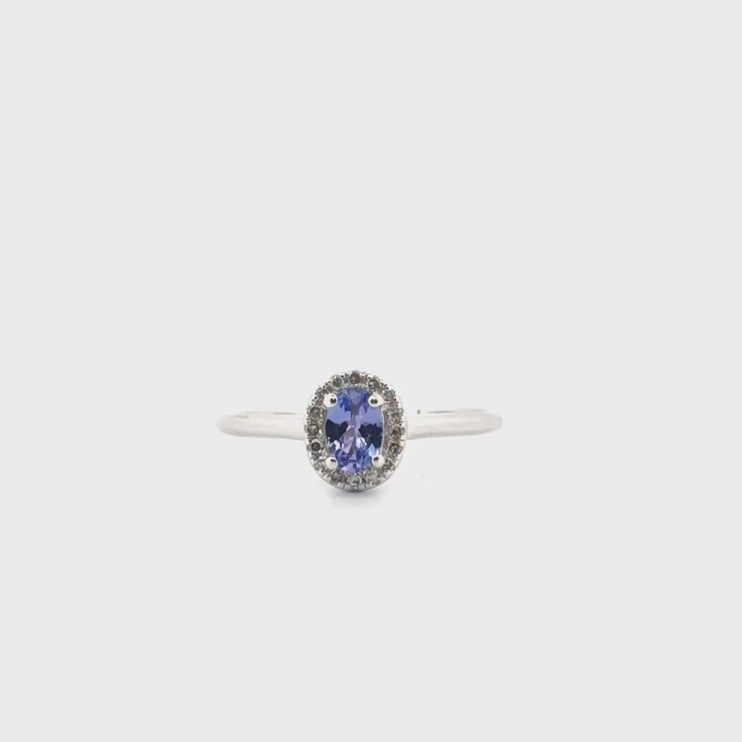 Blue Stone Set in Diamond Halo in 10K White Gold