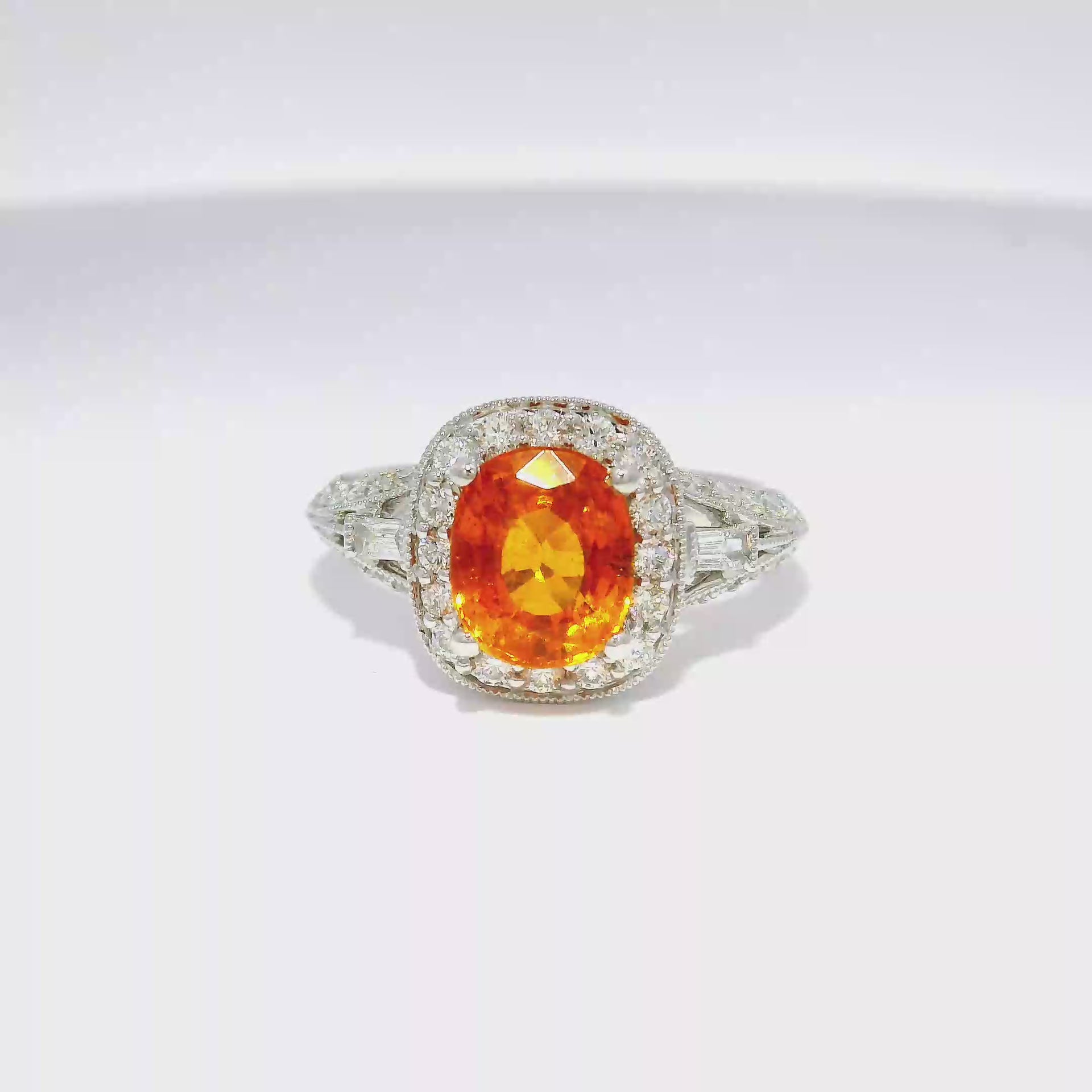 2.21ct. Spessartite Garnet Set in 14K White Gold Diamond Halo Ring