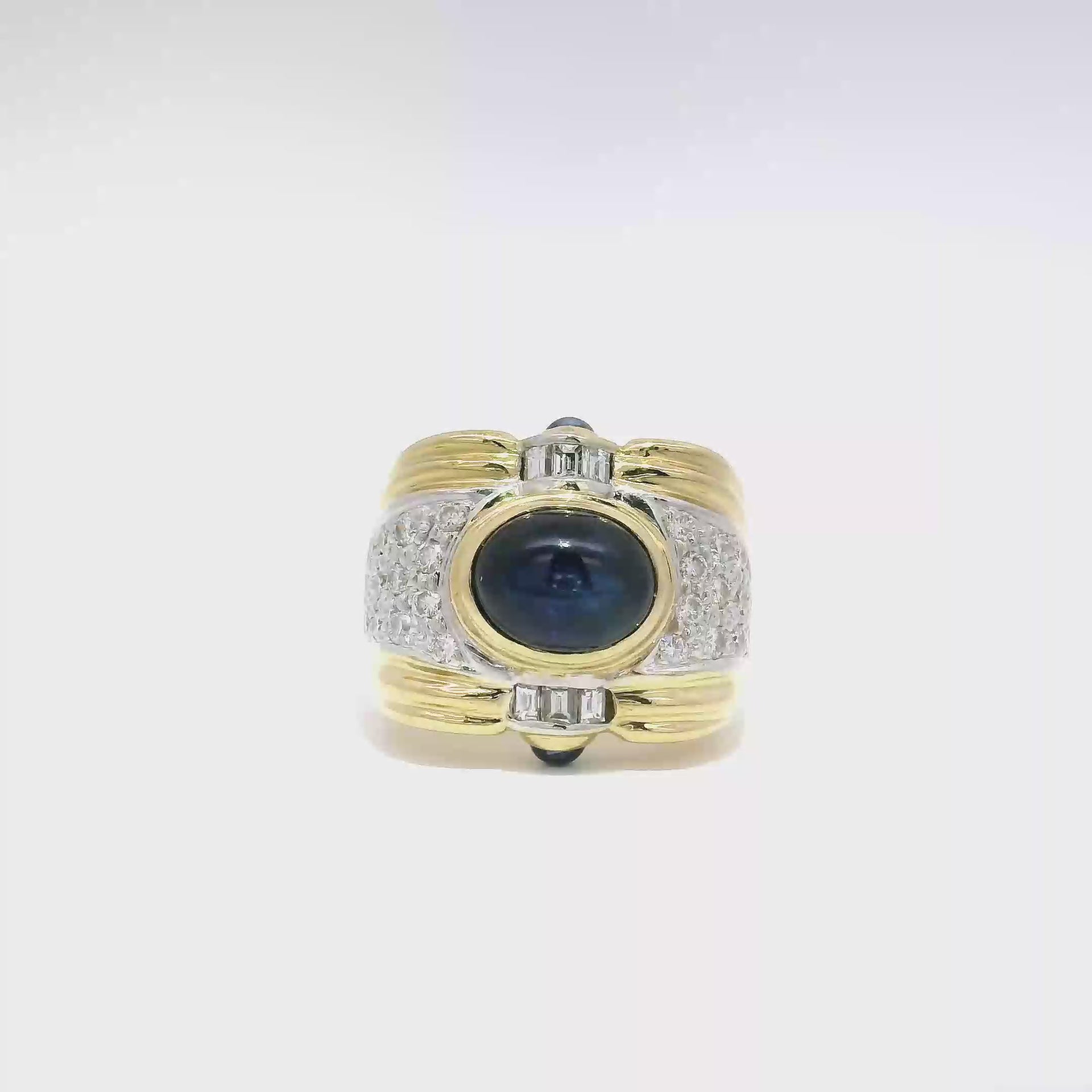 Natural Blue Sapphire Oval Cabochon With Natural Diamond Accents in 18K Yellow Gold