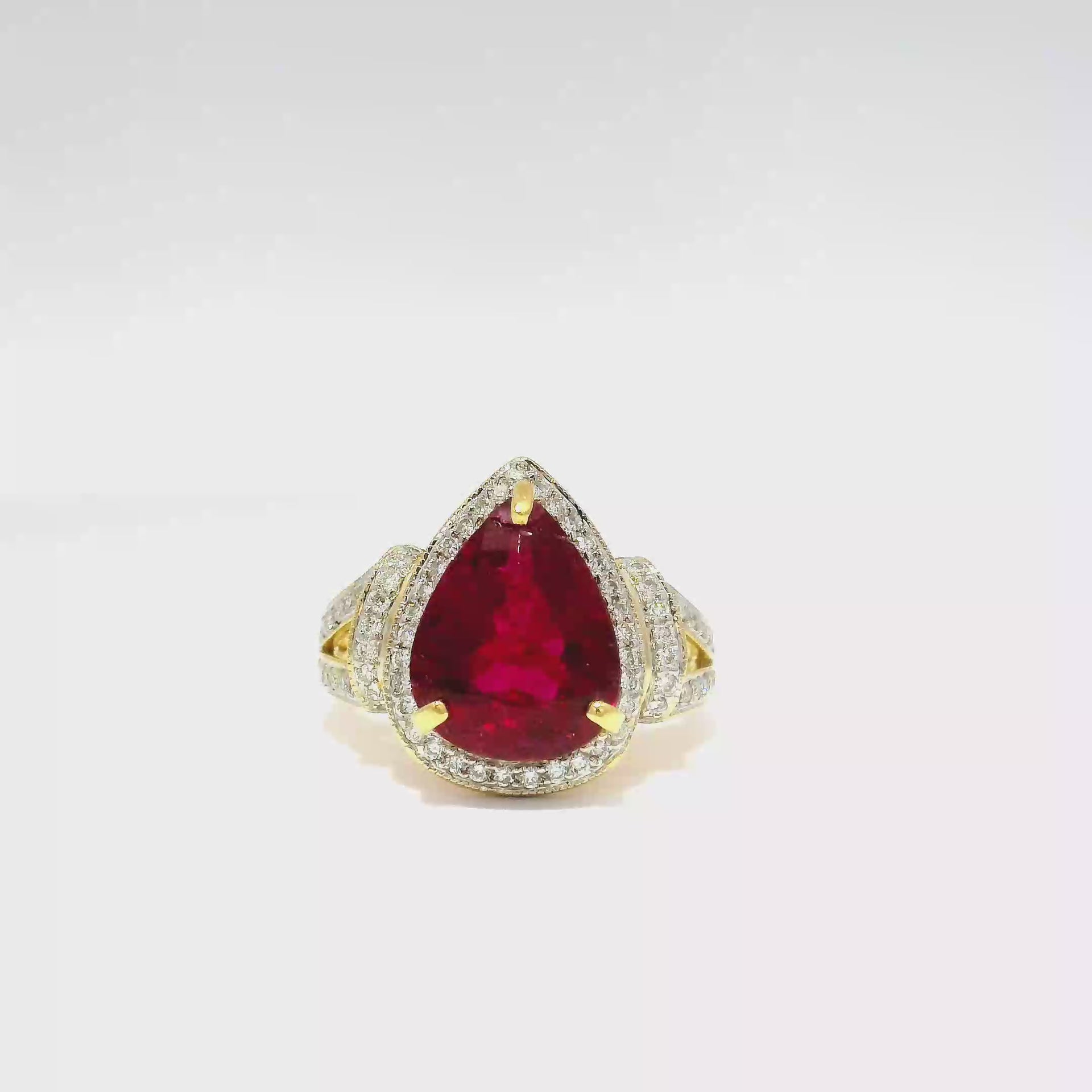 4.15ct. Rubelite Tourmaline in 18K Yellow Gold Diamond Halo Ring
