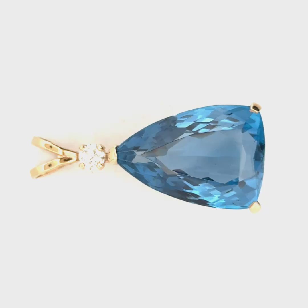 30.76ct. Lab Grown Blue Spinel in 14K Yellow Gold Basket