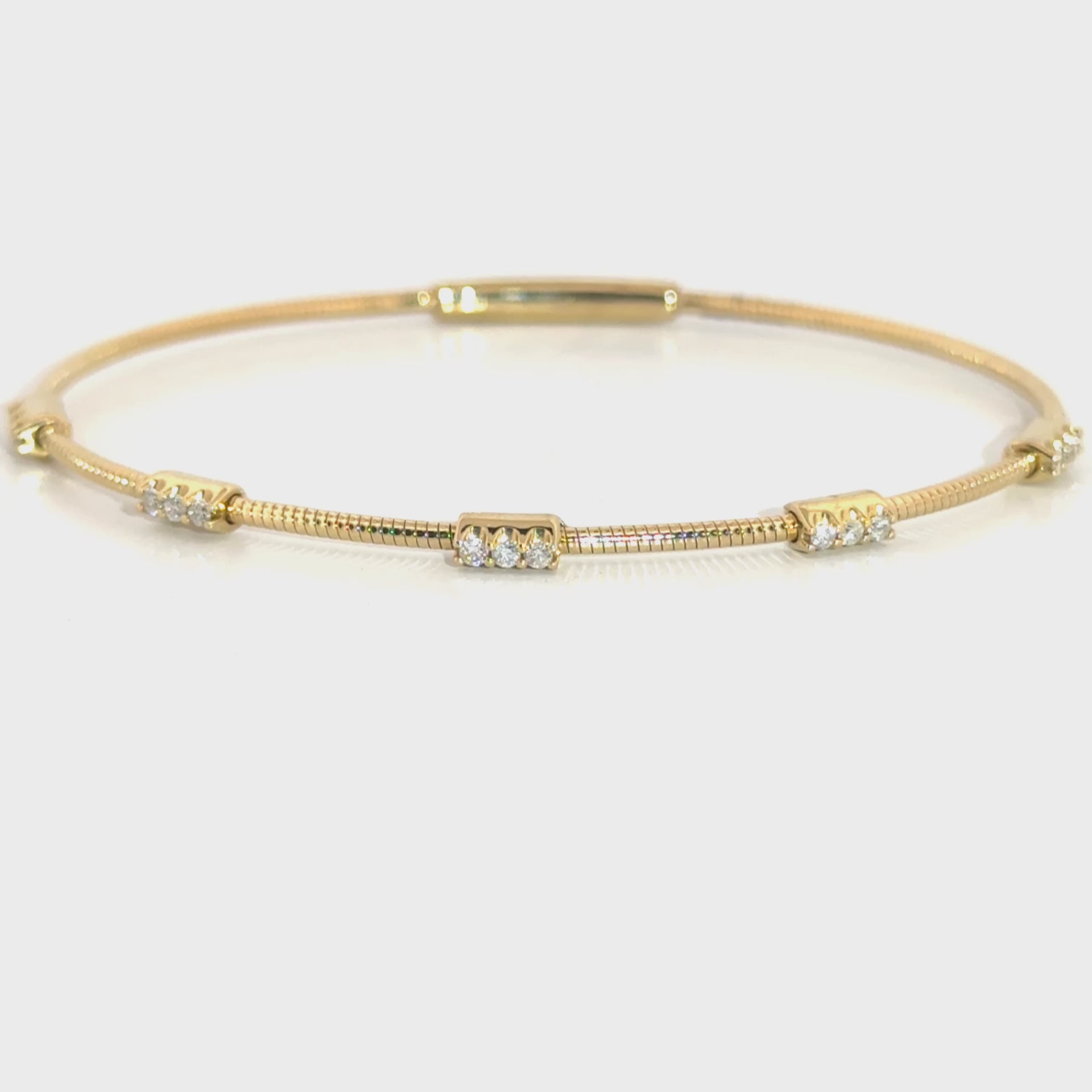 .25cttw. Diamond Flexible Bangle in 14K Yellow Gold