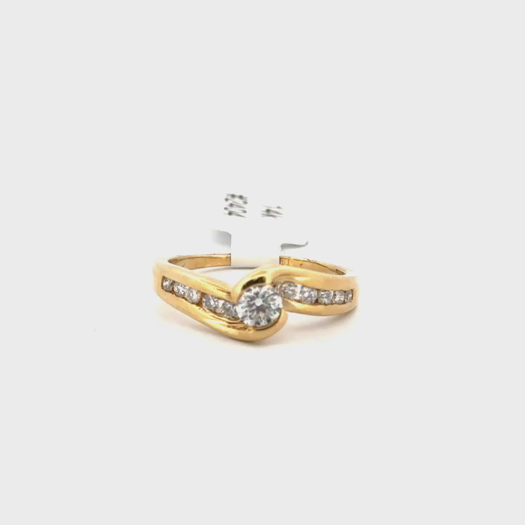 Natural Diamond Bypass Style Ring Set in 14K Yellow Gold