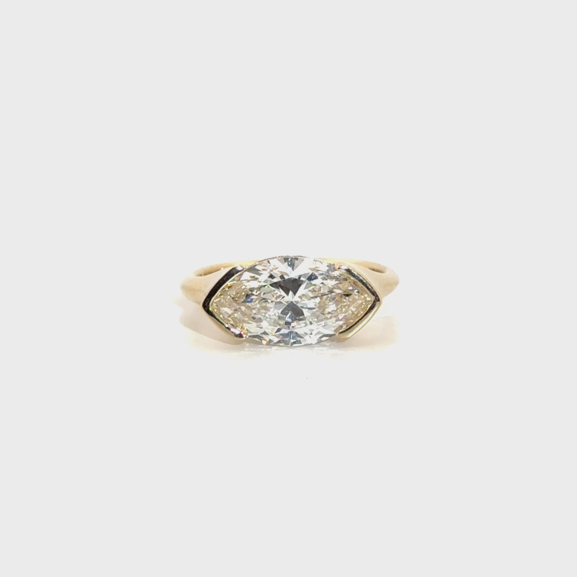 3.02ct. E VS1 Lab Grown Marquise East to West Set in 14K Yellow Gold Half Bezel Mounting
