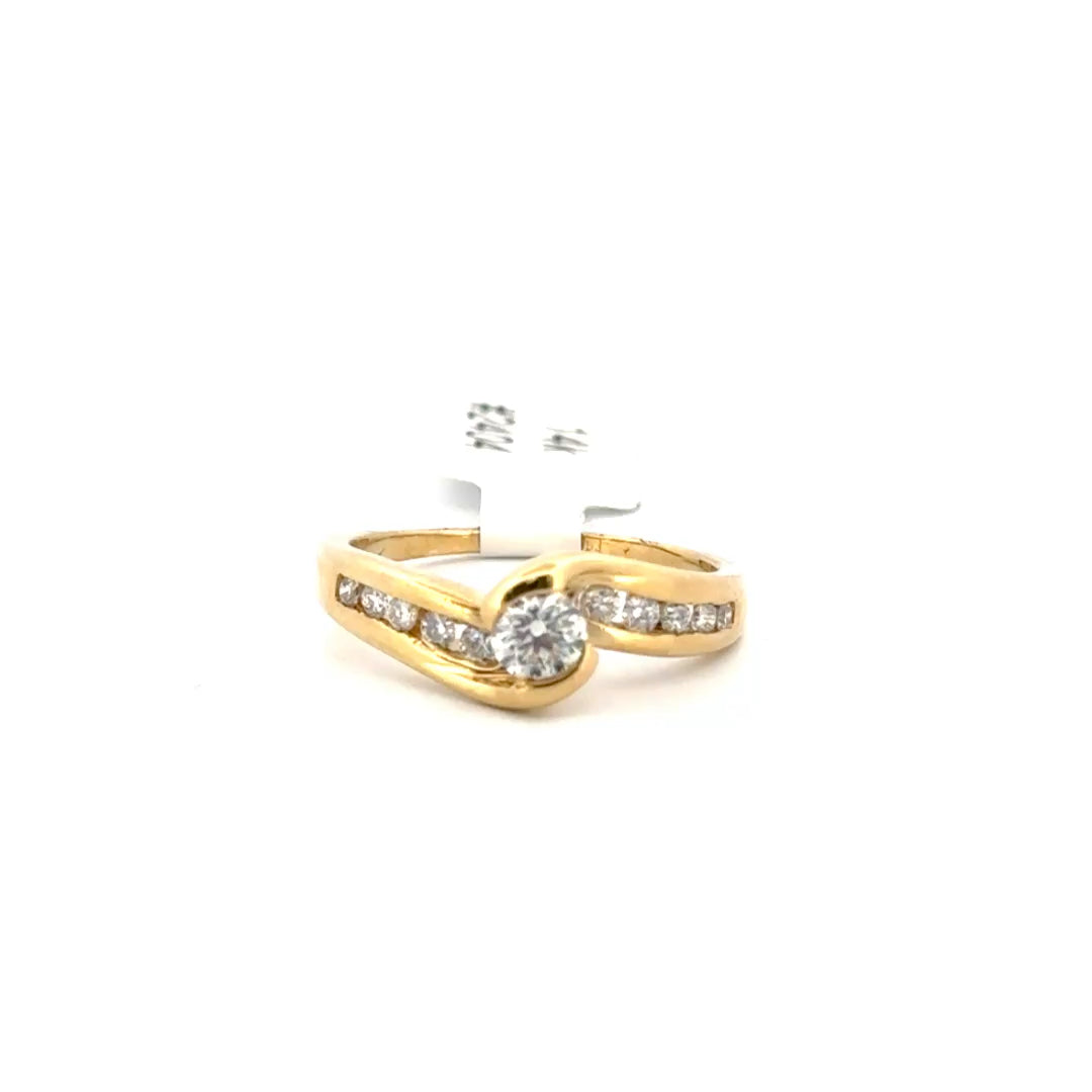 Natural Diamond Bypass Style Ring Set in 14K Yellow Gold